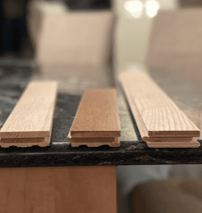 small planks of wood on marble countertop